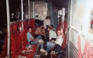 In the back of a United Nations C-130 cargo plane during the Rwanda genocide, 1994.